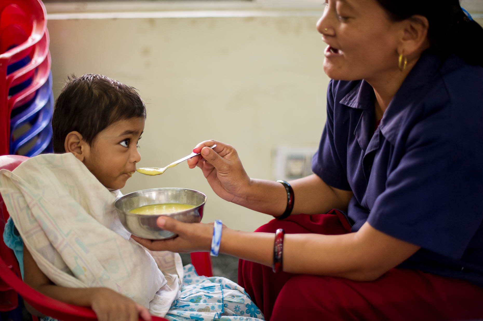 Disabled-orphan-being-fed