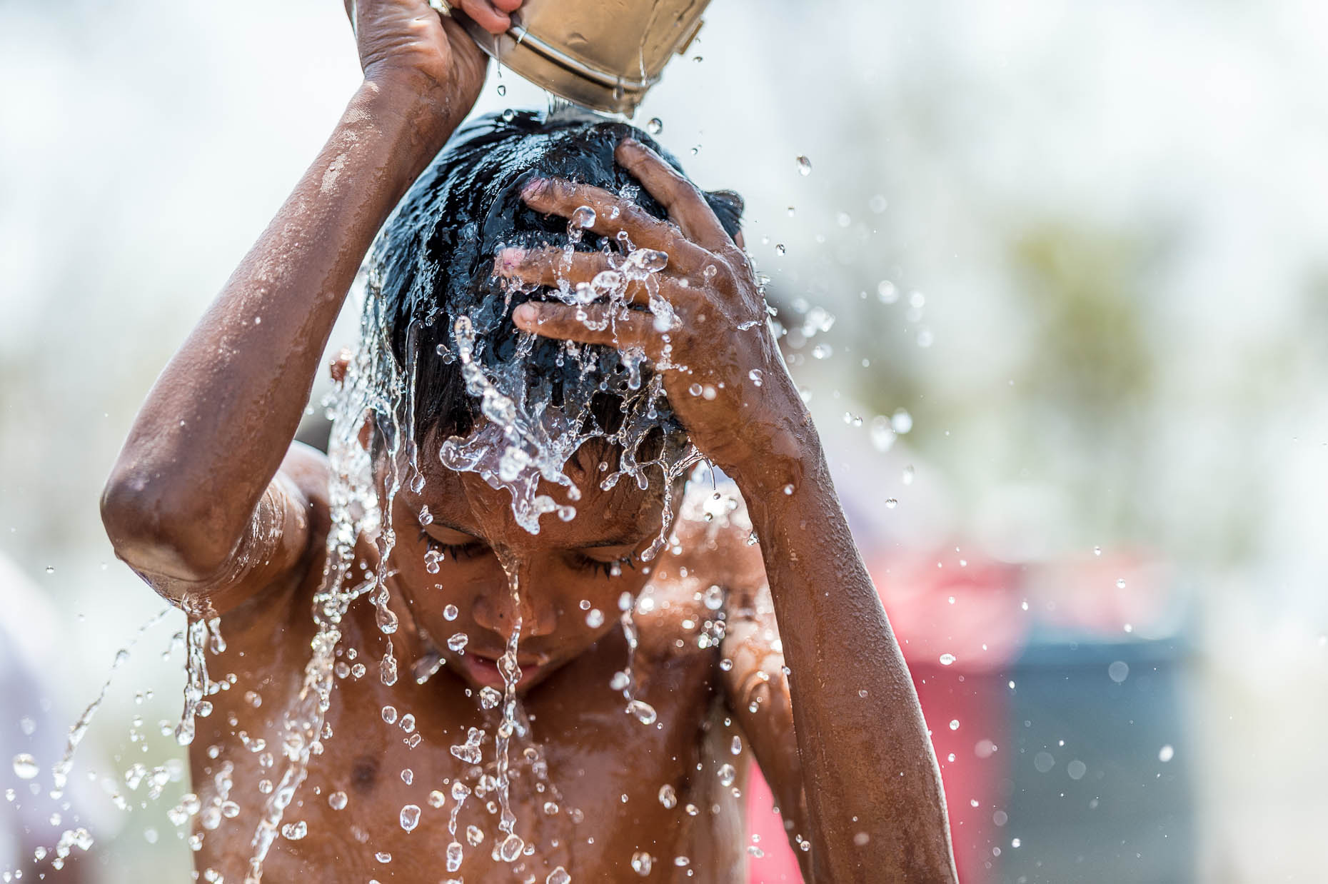 Orphan-taking-bath-India