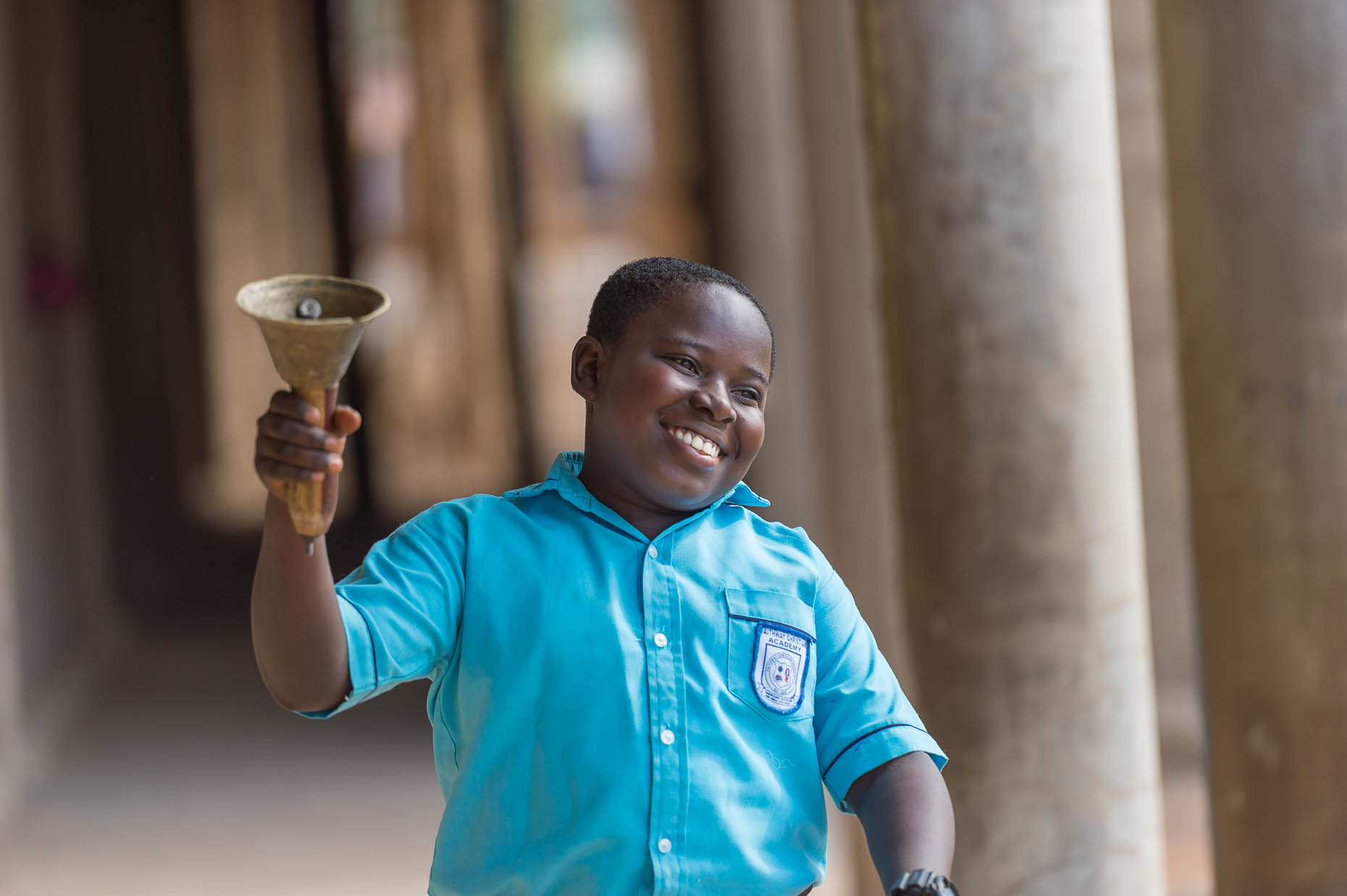 Schoolboy-ringing-bell-Ghana