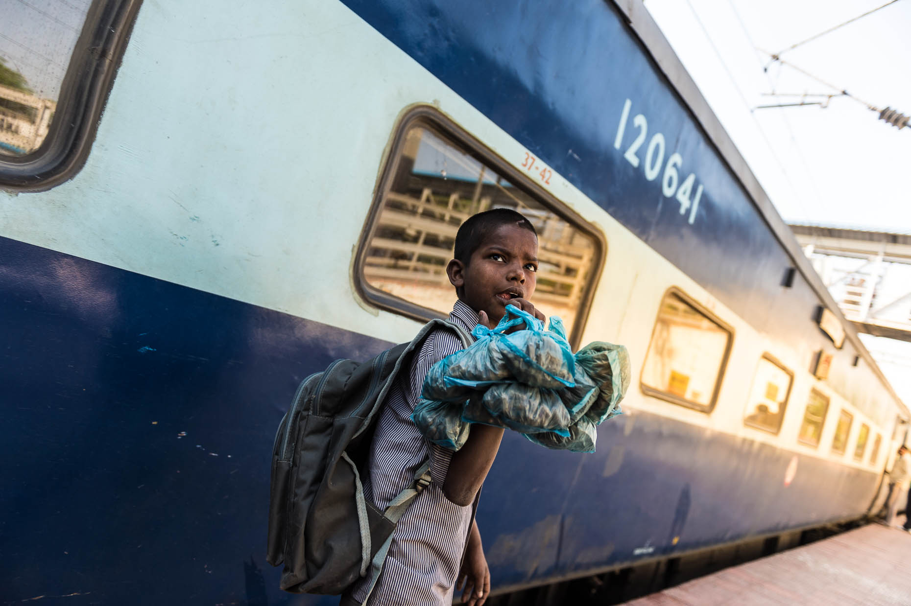Street-child-at-train-at-train-station-India